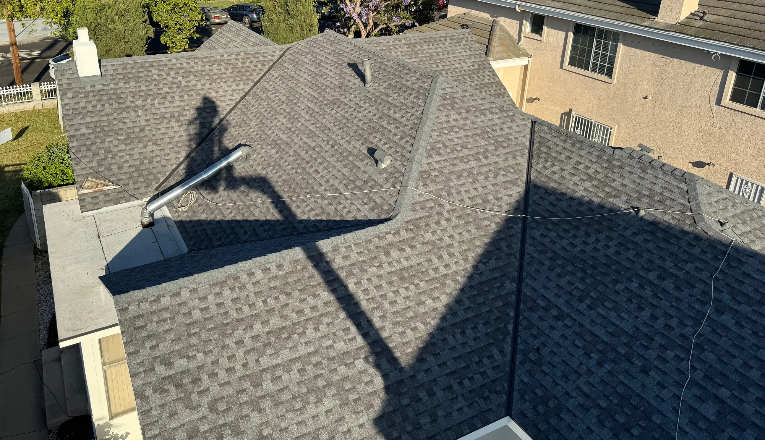 Second angle of the completed architectural shingle roof replacement in Monterey Park, California